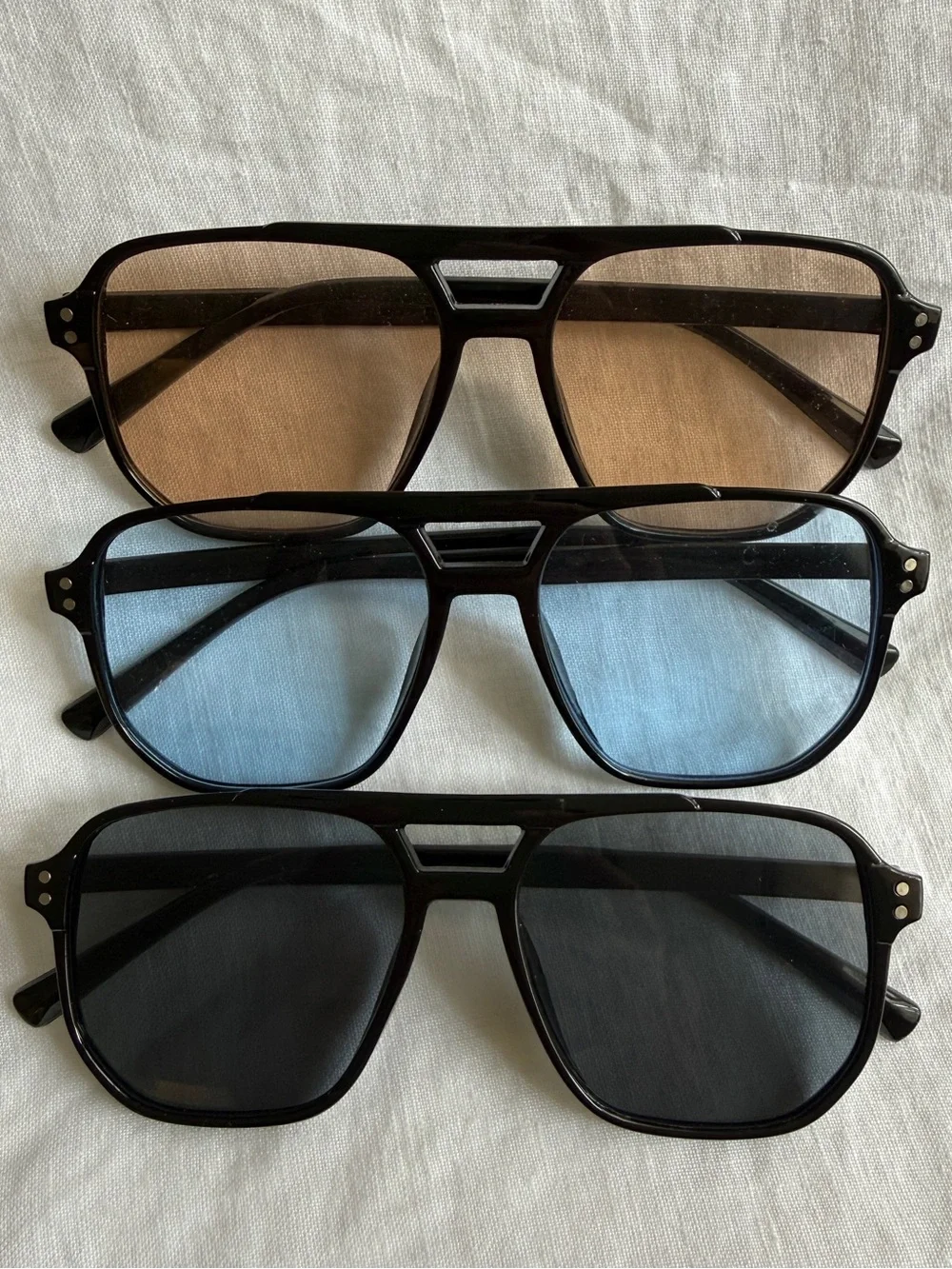 Aviator-Style Black Frame Sunglasses Trio with Brown, Blue, and Black Lenses